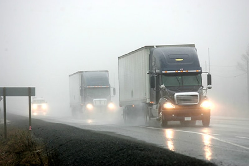 trucks driving in hurricane